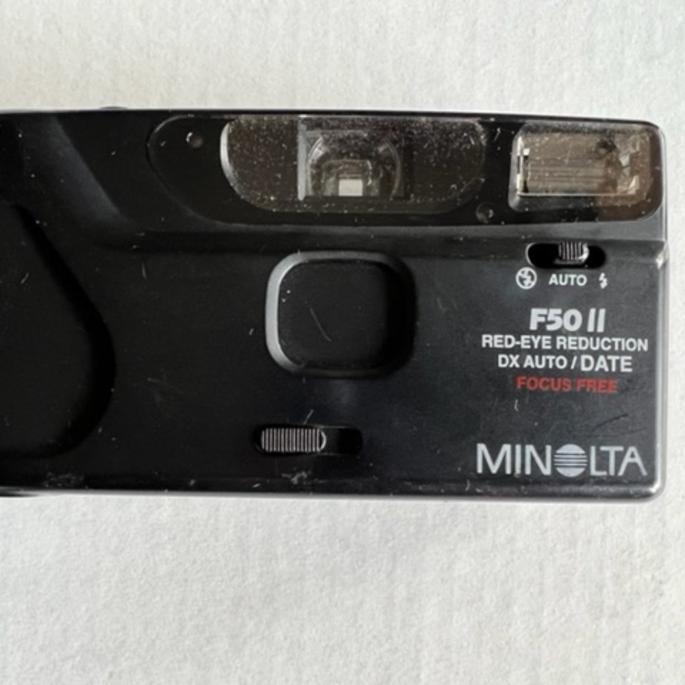 Minolta F50ll Focus Free 35 MM Camera w/ Red-Eye-Reduction.